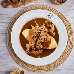 ข้าวห่อไข่หน้าหมูชาบูราดซอสแกงกะหรี่