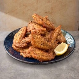 ปีกไก่สูตรซอสพริกไทยดำ 12 ชิ้น