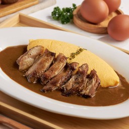 ไข่ลาวาหน้าไก่ย่างราดซอสแกงกะหรี่