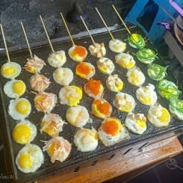 ข.ไข่ เสียบไม้ (ตลาดย่าโมเจ้าเก่า)