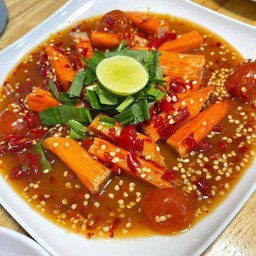 ยำปูอัดไข่แดง (Crab stick and egg yolk yum)