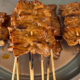 หมูปิิ้ง  1ไม้ (xไม่รวมข้าวเหนียว)