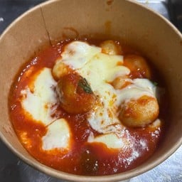 Fresh Gnocchi baked in tomato sauce & Mozzarella cheese