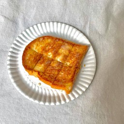 ปังย่างเนยนม 1 แผ่น (เนยแท้)