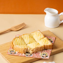 ขนมปังปิ้งเนยนมข้นหวาน