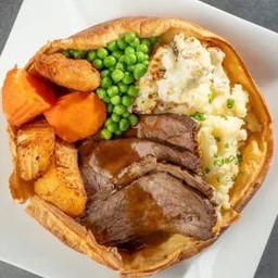 Roast Chicken Dinner In Yorkshire Pudding with Cranberry Sauce