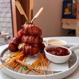 Bacon wrapped sausage