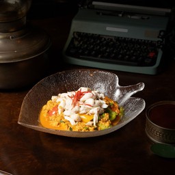 ผัดผงกะหรี่เนื้อปู