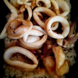 Fried Squid With Garlic On Rice