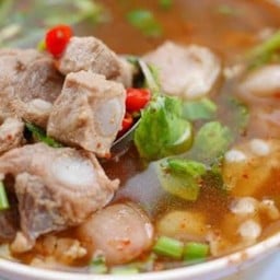 ร้านคอหมูย่างเมืองร้อยเกิน