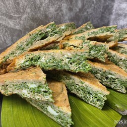 ไข่เจียวชะอม 1 ชิ้น