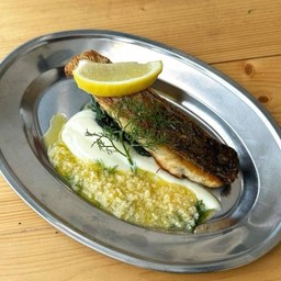 Grilled sea bass with dill lemon sauce, cauliflower purée and sautéed spinach
