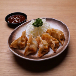 เกี๊ยวซ่า ราดซอส X.O. (D)