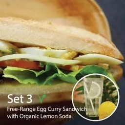 Free-Range Egg Curry Artisanal Sandwich half with Organic Lemon Soda