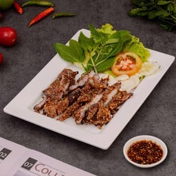 Crying tiger grilled pork with a spicy dipping sauce