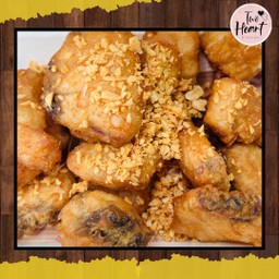 ปลากะพงทอดกระเทียม