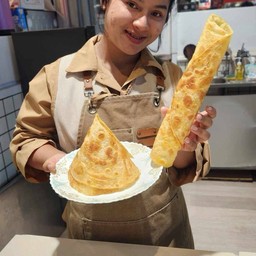 โรตีเนยสดงาดำโรยนม