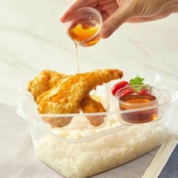 ข้าวปลากระพงใหญ่แล่ทอดราดน้ำปลา