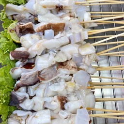 คอหมึกปิ้งย่าง พร้อมน้ำจิ้มซีฟู้ดรสเด็ดของทางร้าน