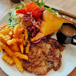 สเต็กหมูพริกไทยดำ