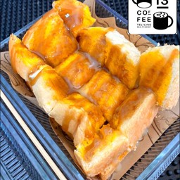 ปังปิ้งเนยนมราดคาราเมล (2แผ่น)