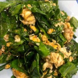 ปวยเล้งผัดไข่