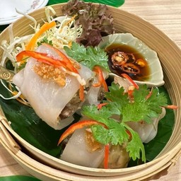 Steamed rice noodle roll with minced pork, tofu and vegs