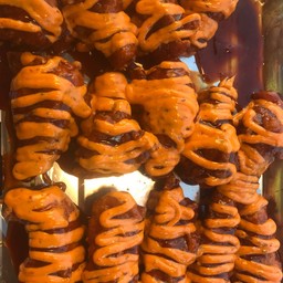 ปีกบนไก่ ราดซอสพิซ่า 1ชิ้น