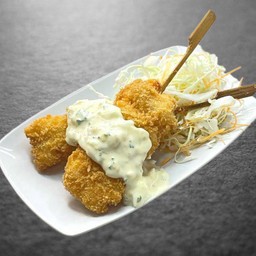 FRIED SALMON BELLY/ท้องปลาเเซลมอนเสียบไม้ ชุปแป้งทอด