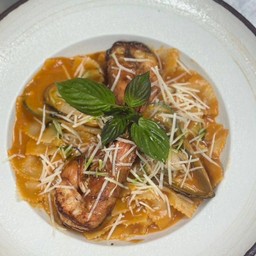 Farfalle arrabiata with seafood