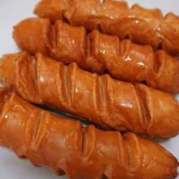 ไส้กรอกจัมโบ้ทอดกรอบ 1ชิ้น (กับข้าว)