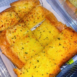 ปังแผ่นกระเทียมชีสเยิ้มๆ