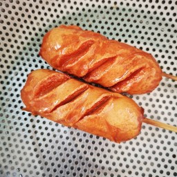 ฮอทดอกหนังกรอบ (ส้ม) ทอด