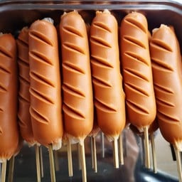 ฮอทดอกหนังกรอบ จัมโบ้ (ส้ม) นึ่ง