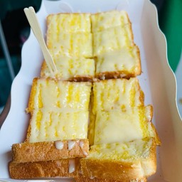 ขนมปังฟาร์มเฮ้าปิ้ง เนยนมน้ำตาล 4 แผ่น