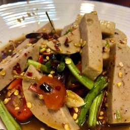 ตำเหลาหมูยอใส่ปลาร้า  Spicy Pork Salad