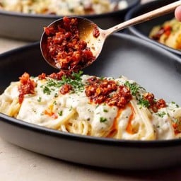 Cream Sauce & Parmesan Cheese Topped with Crispy & Spicy Chilli Garlic