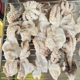 หมึกย่างเล่นไฟ เตาถ่าน