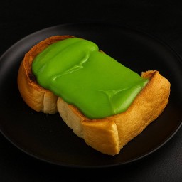 แผ่นเนยน้ำตาล ราดสังขยาใบเตย