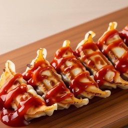 เกี้ยวซ่าแซลมอนซอสเผ็ดเกาหลี  (ราดซอสโกชูจังเผ็ดหวานแบบเกาหลีแท้)