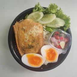 ข้าวห่อหมกย่างหน้าปูม้า ไข่เป็ดยางมะตูม
