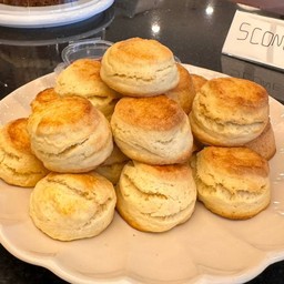 Scone with homemade jam and cream