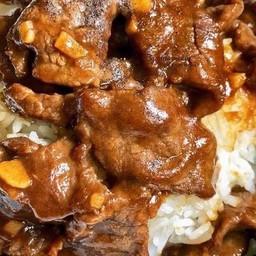 ข้าวเครื่องในไก่ผัดน้ำมันหอย