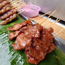หมูปิ้งโบราณ  โปรโมชั่น 10 ไม้แถม 1 ใบ