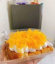 ปังปิ้งวิปครีมฝอยทองราดนม