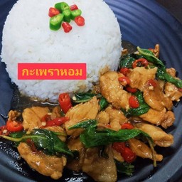 ข้าวกะเพราหมูชิ้น Stir fried pork basil leaves  on rice