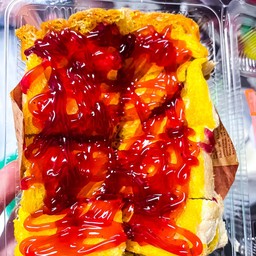 ขนมปังปิ้งเนย+ราดซอสบลูเบอร์รี่