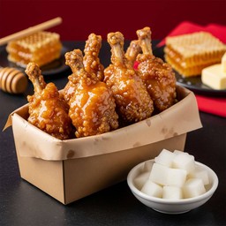 ไก่ปีกบนทอดคลุกซอสฮันนี่บัตเตอร์