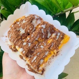 ขนมปังปิ้งโอวัลตินราดนม