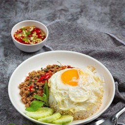 Stir-fried chicken with basil fried egg and steamed rice